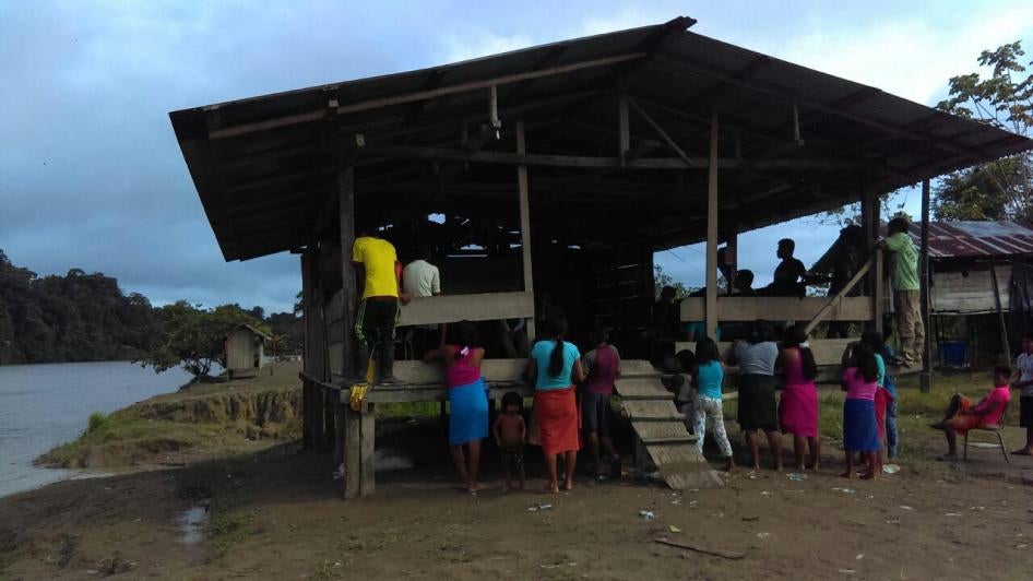 Wounaan people gather in a community building by the San Juan river, in Chocó, Colombia, March 2017. 