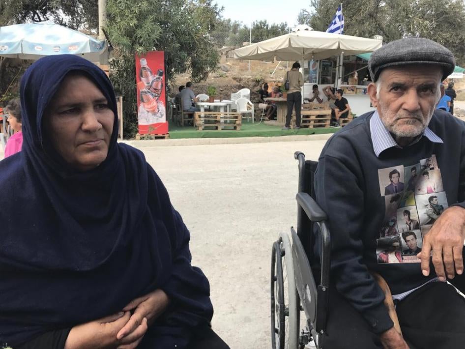 An older woman and man from Afghanistan, both with physical disabilities, live in Kara Tepe camp, on Lesbos and were unaware of the housing scheme for “vulnerable” groups. Both have had difficulty getting medical care. Photograph by Shantha Rau Barriga. ©