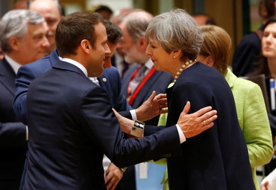 British Prime Minister Theresa May and French President Emmanuel Macron attend the EU summit in Brussels, Belgium, June 22, 2017.
