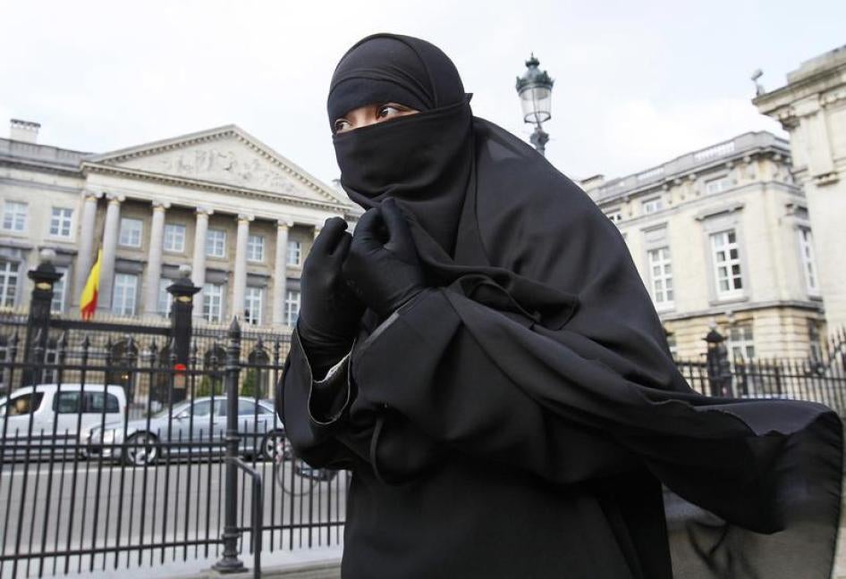 Salma, a 22-year-old French national living in Belgium who chooses to wear the niqab after converting to Islam, gives an interview to Reuters television outside the Belgian Parliament in Brussels in this April 26, 2010 file photo.