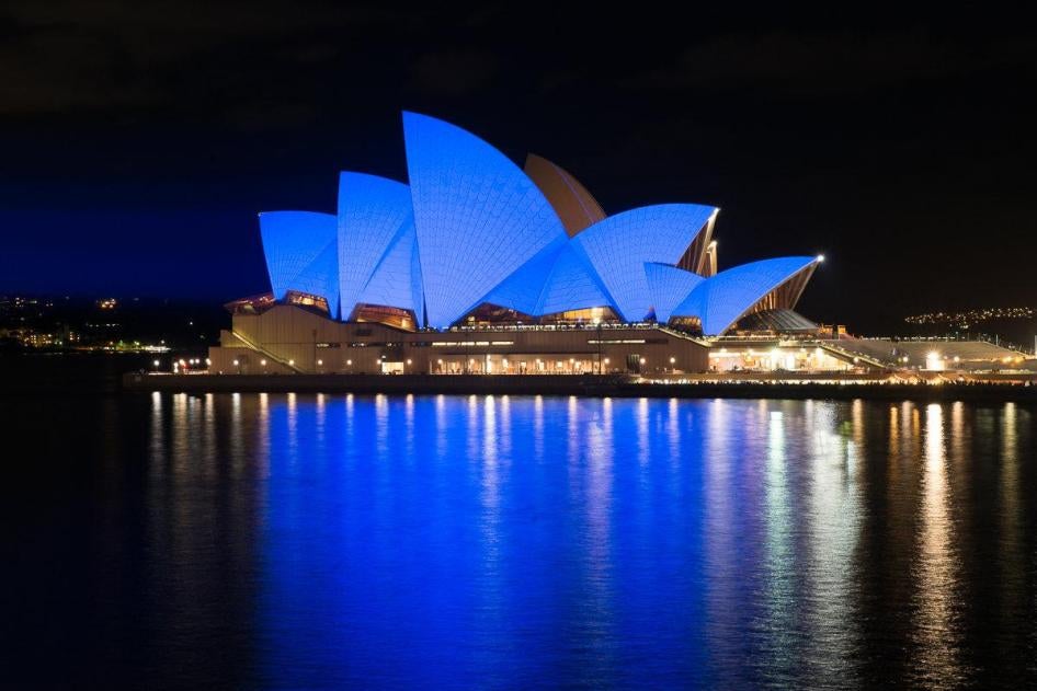 Sydney Opera House illuminated in blue. Sydney, Australia
