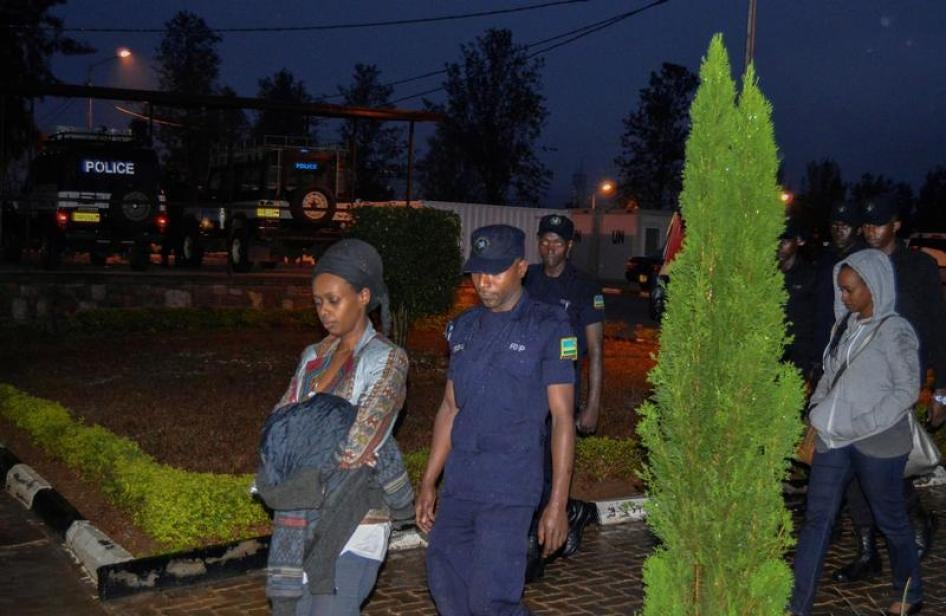 Would-be independent presidential candidate Diane Rwigara is seen being taken to the police station for interrogation in Kigali, Rwanda, September 4, 2017.