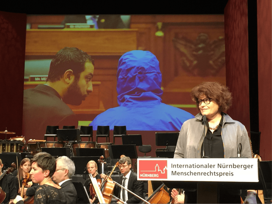 Garance Le Caisne, author of the book "Opération César: Au coeur de la machine de mort syrienne" (Operation Caesar. In the Heart of the Syrian Death Machine), accepting the award on behalf of “Caesar” and his group of collaborators. The hooded man project