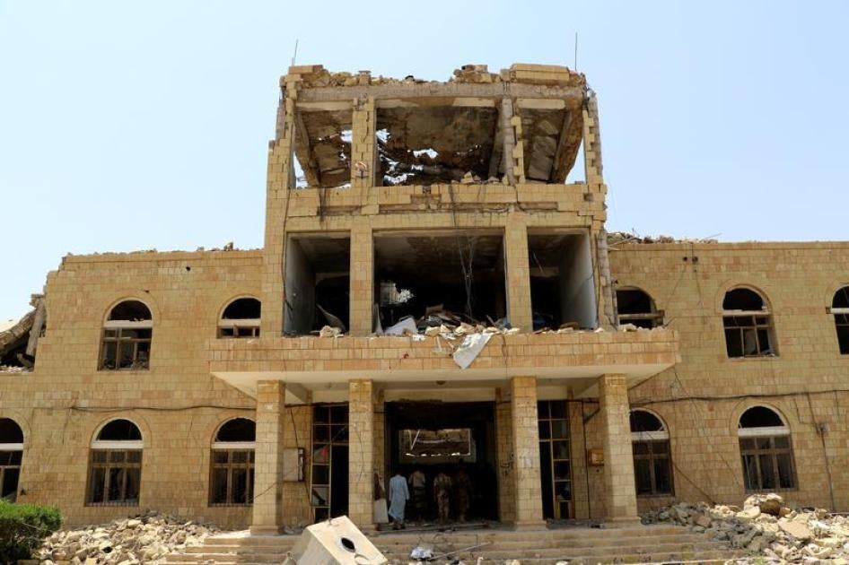 Officials tour a government compound destroyed by recent Saudi-led air strikes in the northwestern city of Saada, Yemen September 3, 2017. 
