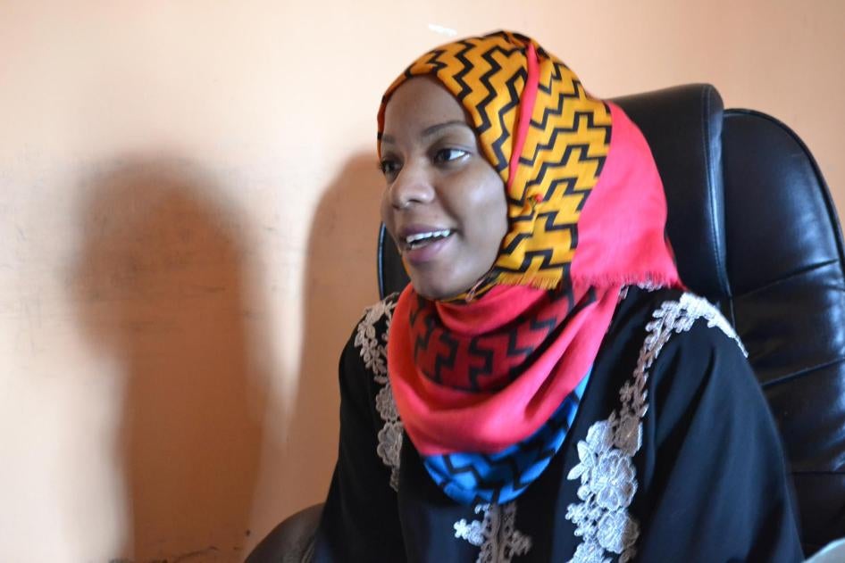 Lulu Omar, coordinator for domestic workers at Zanzibar: Conservation, Hotels, Domestic and Allied Workers Union (CHODAWU-Z), describing her campaign to register Tanzanian domestic workers before they migrate. Stone Town, Zanzibar, Tanzania.
