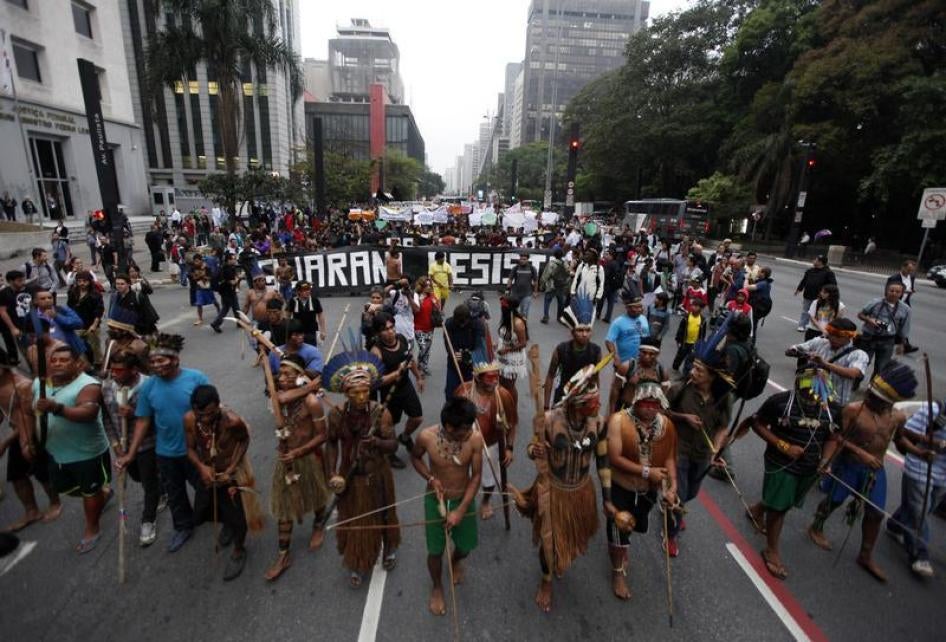 Indigenous Indians from various parts of Brazil take part in a demonstration against proposed constitutional amendment PEC 215, which amends the rules for demarcation of indigenous lands, in Sao Paulo, October 2, 2013. 