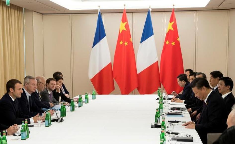 French President Emmanuel Macron and Chinese President Xi Jinping attend a bilateral meeting in Hamburg, Germany, July 8, 2017.