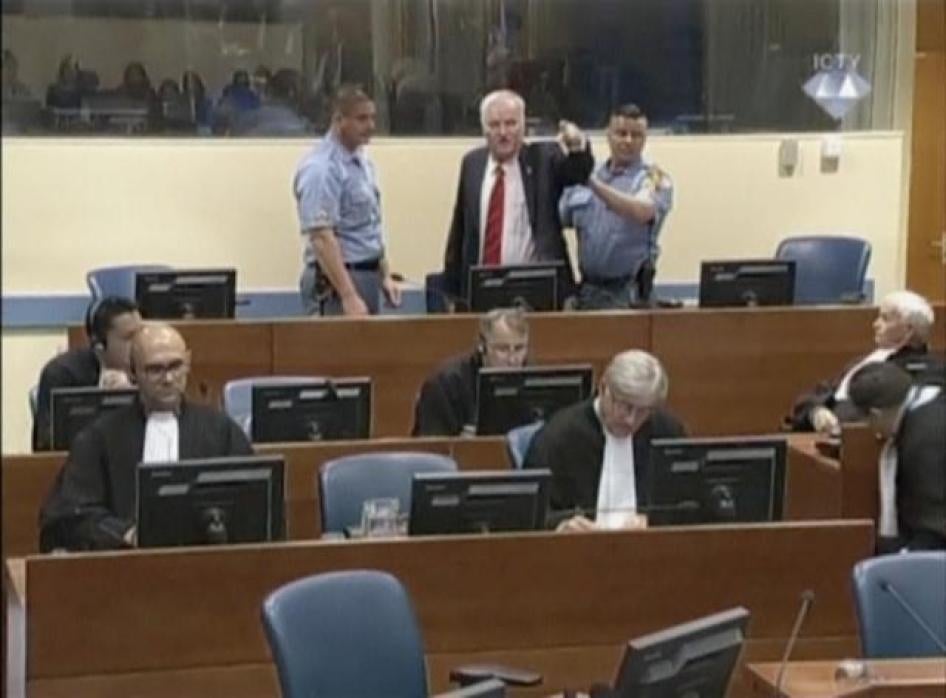 Ratko Mladic reacts in court at the International Criminal Tribunal for the former Yugoslavia in the Hague.