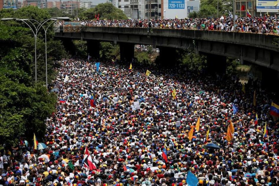 Anti-government demonstrators march during the so-called "mother of all marches" in Caracas, Venezuela, April 19, 2017.