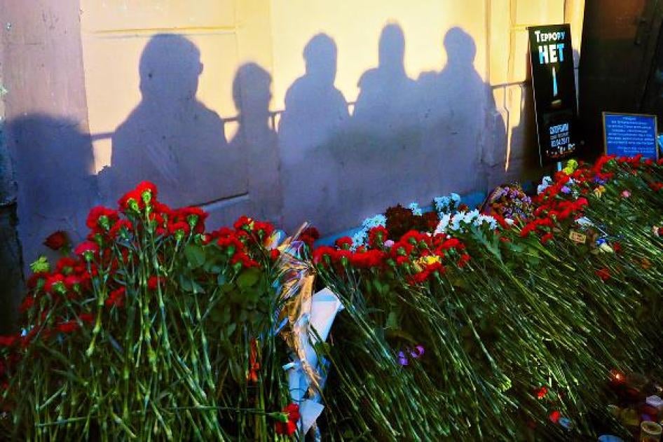Mourners place flowers at the Tekhnologichesky Institut subway station in St. Petersburg to commemorate victims of the April 3, 2017 suicide bombing on a subway train.