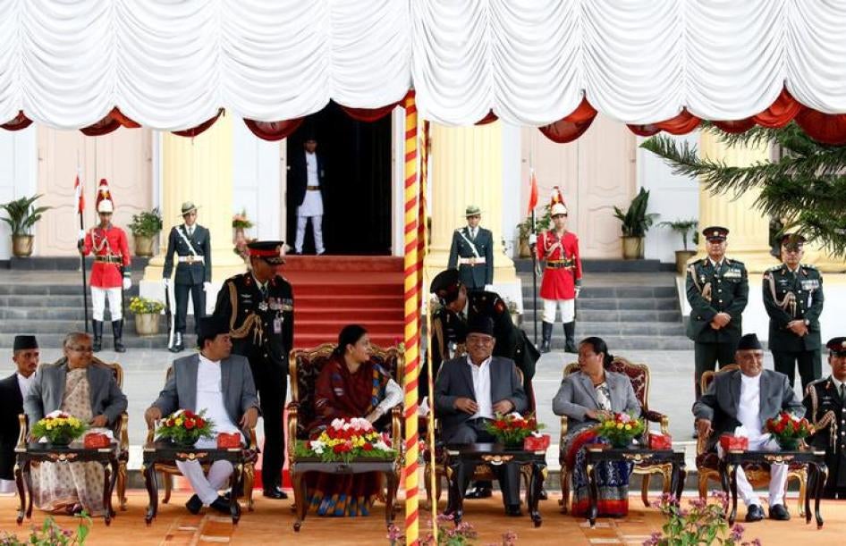 epalese Prime Minister Pushpa Kamal Dahal (4th L), also known as Prachanda, along with President Bidhya Devi Bhandari (3rd L), Vice President Nanda Kishor Pun (2nd L), and Chief Justice of the Supreme Court Sushila Karki (L).