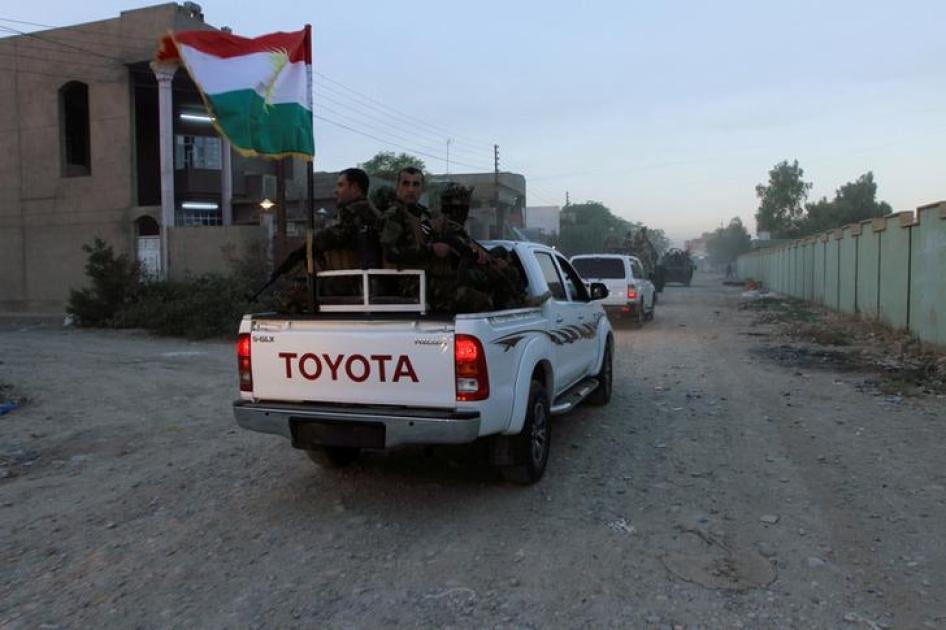 قوات أمن تابعة لحكومة إقليم كردستان تطوف شارعا في مدينة كركوك، العراق، 22 أكتوبر/تشرين الأول 2016.