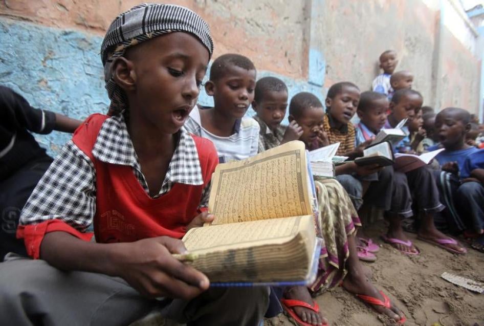 Children learning to read the Quran at the Gaabow Islamic school in Somalia's capital, Mogadishu, August 2013. Parents and teachers told Human Rights Watch that Al-Shabab militants threatened and on occasion abducted teachers and children from schools in 