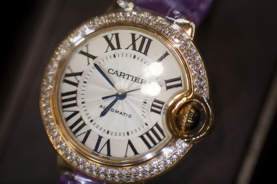 A Cartier watch sits on display at a store in New York, US, November 2014. 