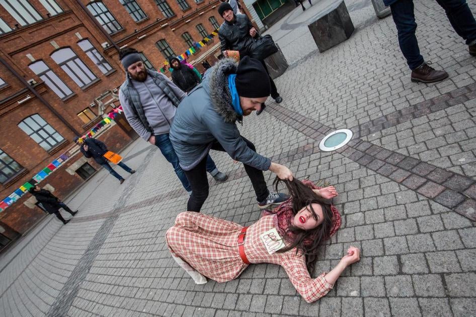 A A protest performance staged by women’s rights activists in Saint Petersburg after Russia’s adoption of domestic violence legislation, January 2017. 