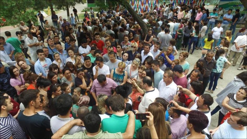 A June 2017 gathering of citizen activists in Tashkent’s Bobur Park to collect signatures and demand an investigation into the murder of medical student Jasur Ibragimov.