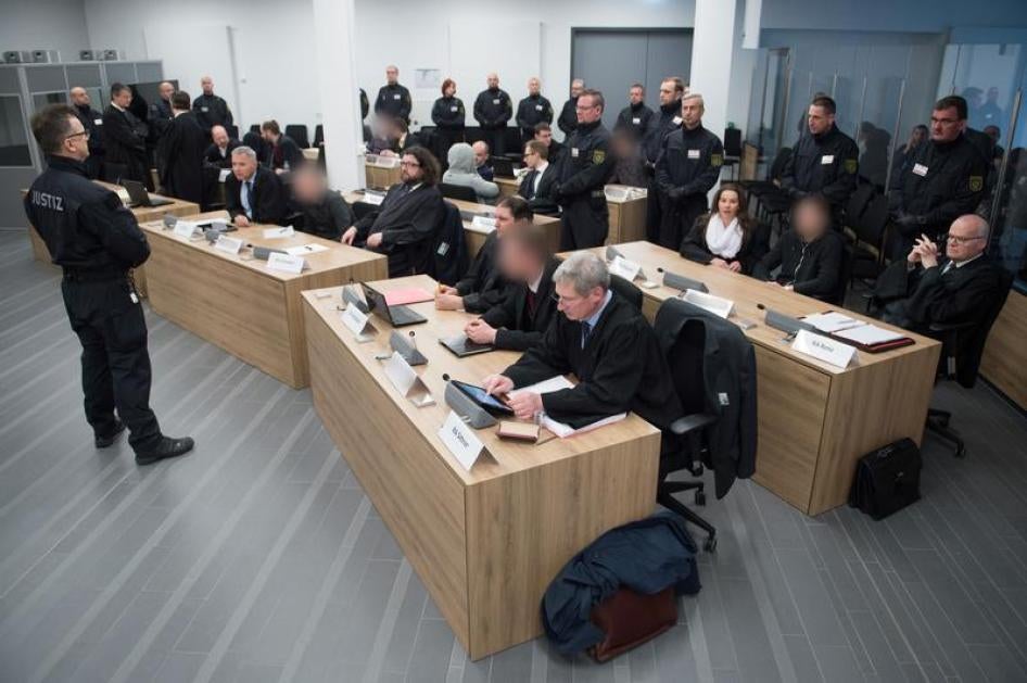 Defendants of the the far-right group "Gruppe Freital" wait for their verdict in a courtroom in Dresden, Germany, March 7, 2018.