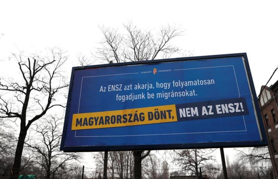 A government billboard is seen ahead of April 8 parliamentary election in Budapest, Hungary March 6, 2018. The billboard reads: 'The U.N. wants us to accept migrants on a continuous basis. HUNGARY DECIDES, NOT THE U.N.'