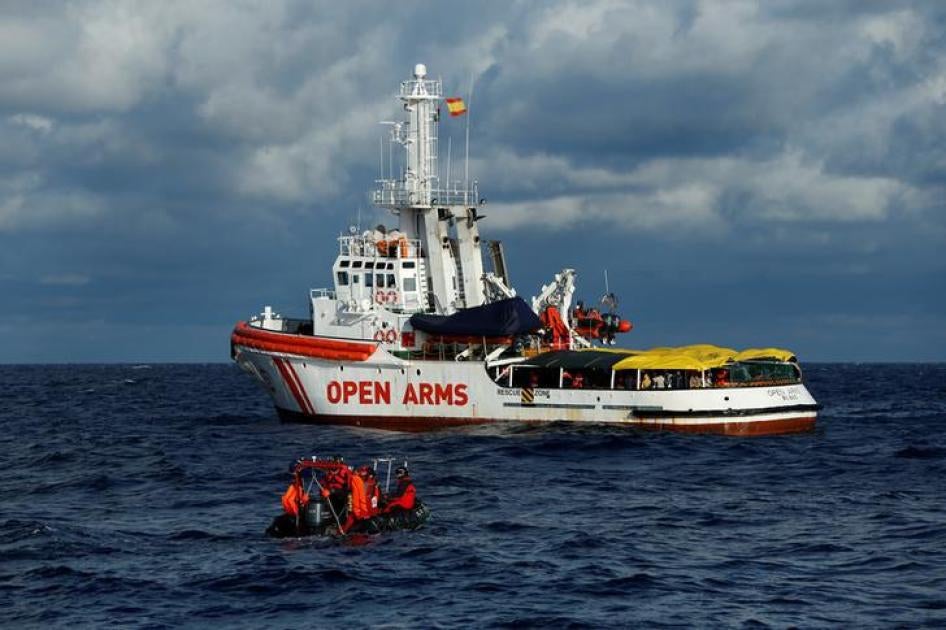 A rigid hulled inflatable boat (RHIB) approaches the MV Open Arms, the search and rescue ship of Proactiva Open Arms, in the central Mediterranean off the coast of Libya, December 16, 2017
