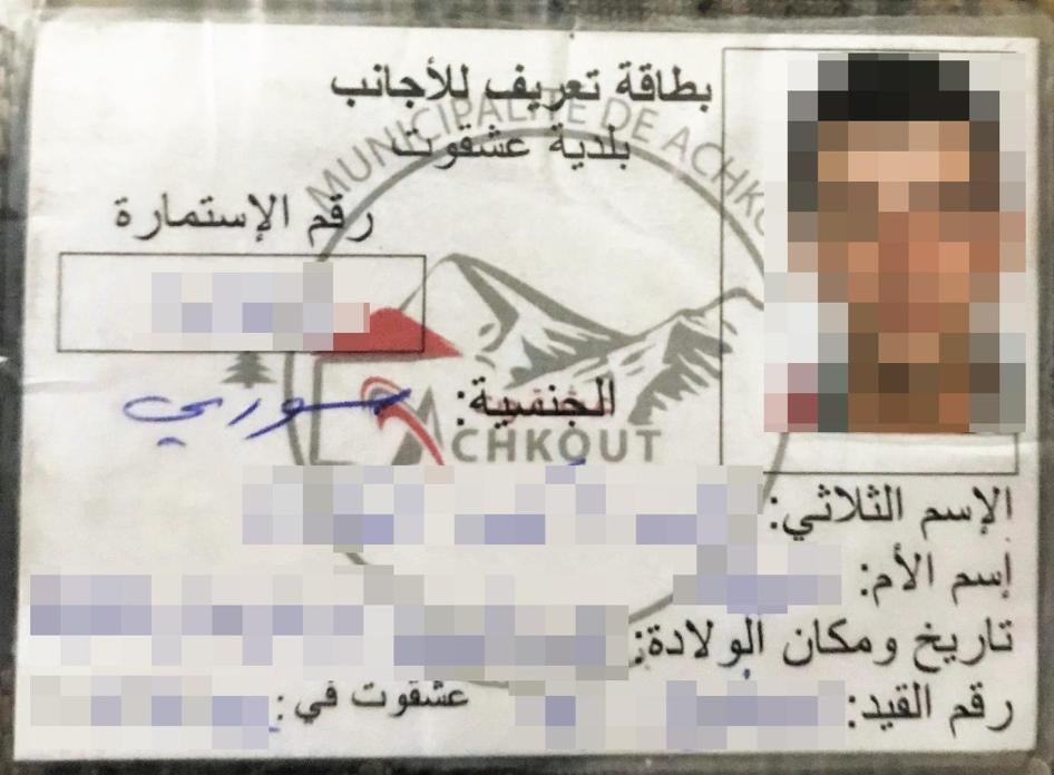 Syrian refugee’s identification card issued by Ashqout Municipality. There is no provision in Lebanese law that authorizes municipalities to issue their own ID cards for Syrian nationals. Identifying information deleted.