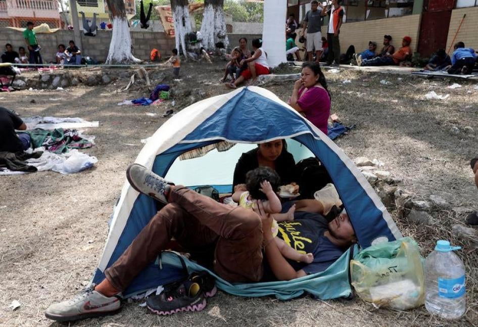 Central American migrants take a break from traveling in their caravan, as they journey to the U.S., in Matias Romero, Oaxaca, Mexico April 3, 2018.