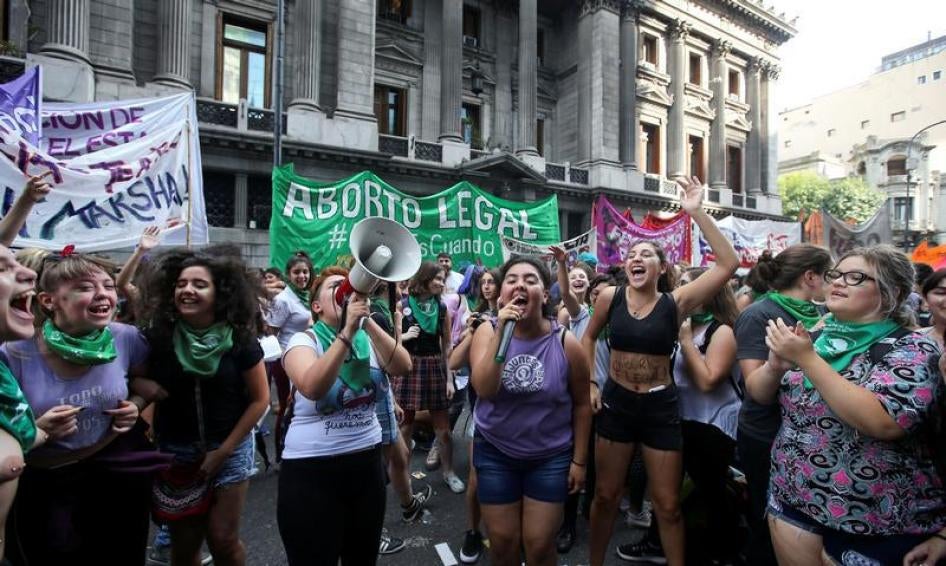 Women’s rights demonstrators take part in a protest in front of National Congress while an abortion bill is debated in Buenos Aires, Argentina, April 10.