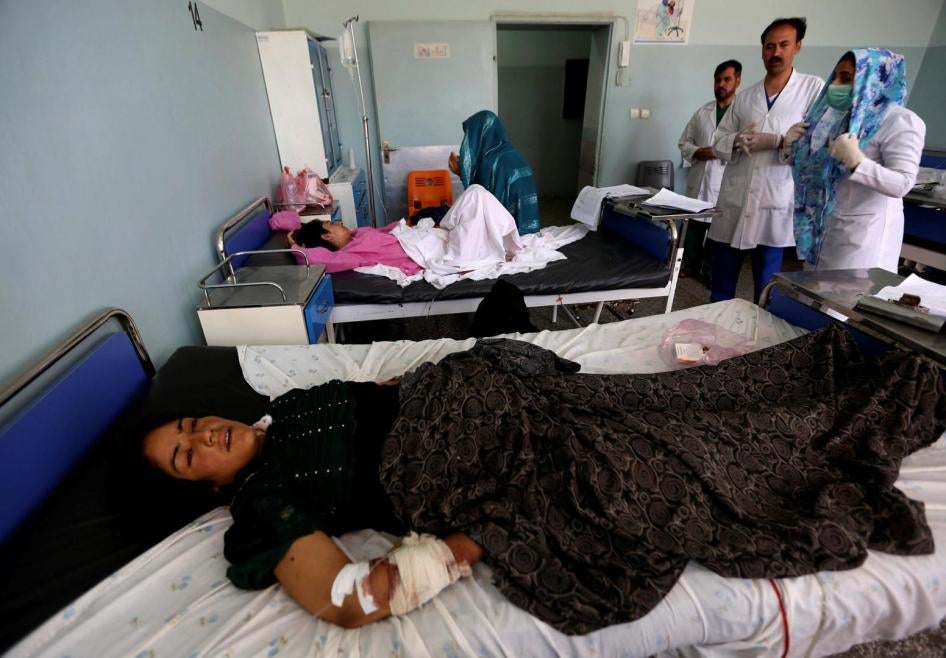 An Afghan woman receives medical treatment after being injured during an airstrike in Herat province, Afghanistan, August 29, 2017.