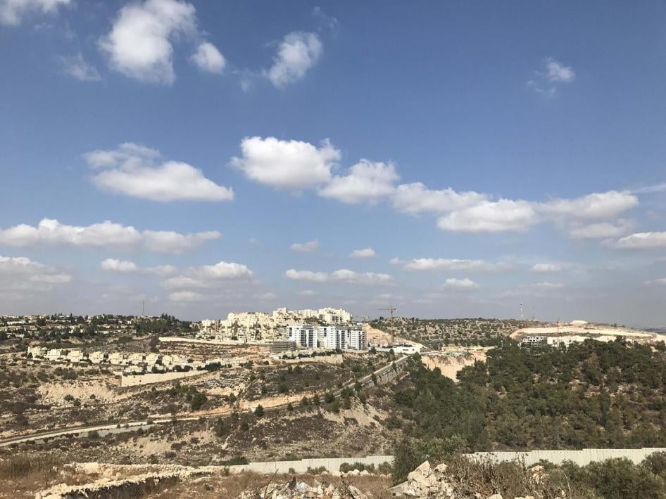 View of the separation barrier and the Israeli settlement of Alfei Menashe from the Palestinian village of Azzun. 