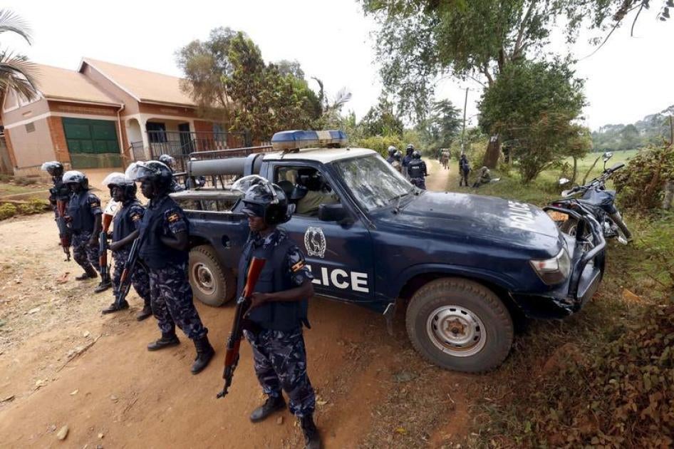 Riot police block a driveway on the outskirts of Uganda's capital Kampala, February 20, 2016.