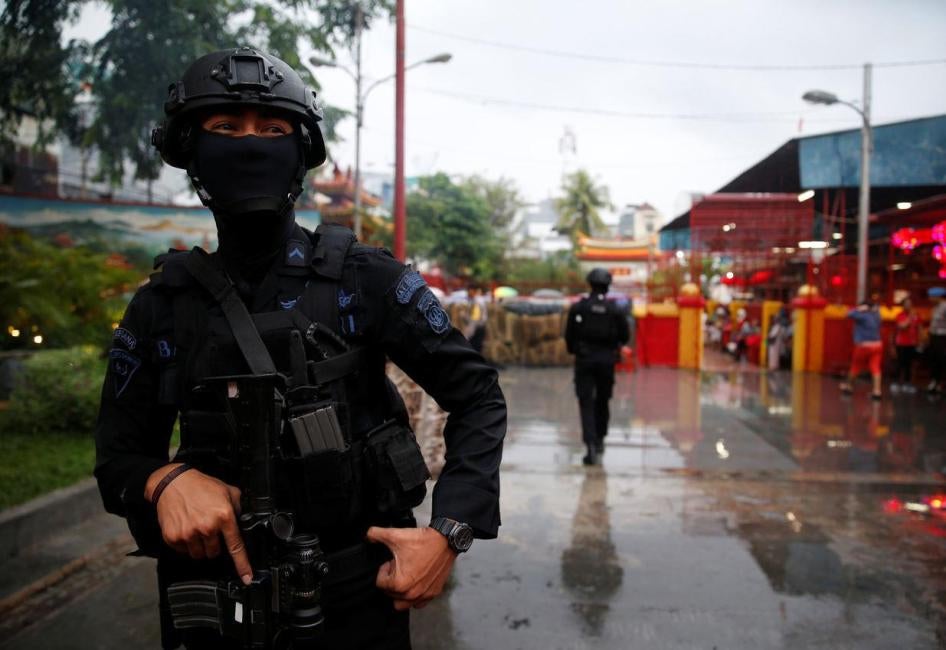 A counterterrorism police officer stands guard during a security sweep in Jakarta, Indonesia, February 16, 2018.
