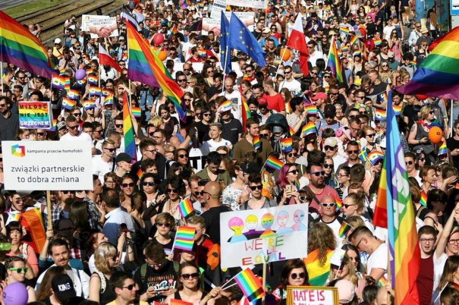 People take part in the annual "Equality Parade" rally of the Lesbian, Gay, Bisexual and Transgender (LGBT) rights supporters in Warsaw, Poland June 3, 2017.