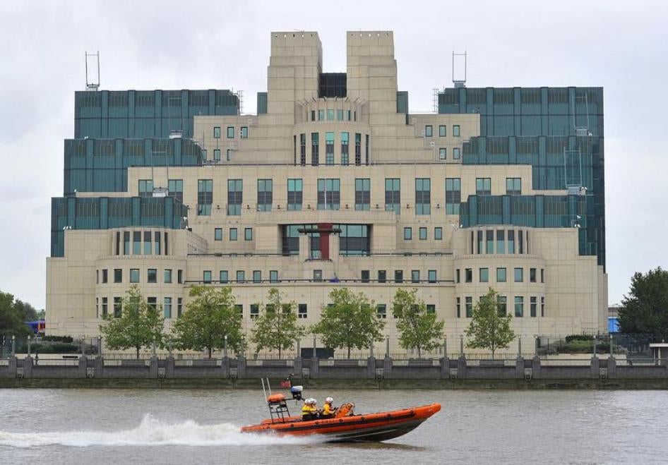 A motorboat passes by the MI6 building in London August 25, 2010.