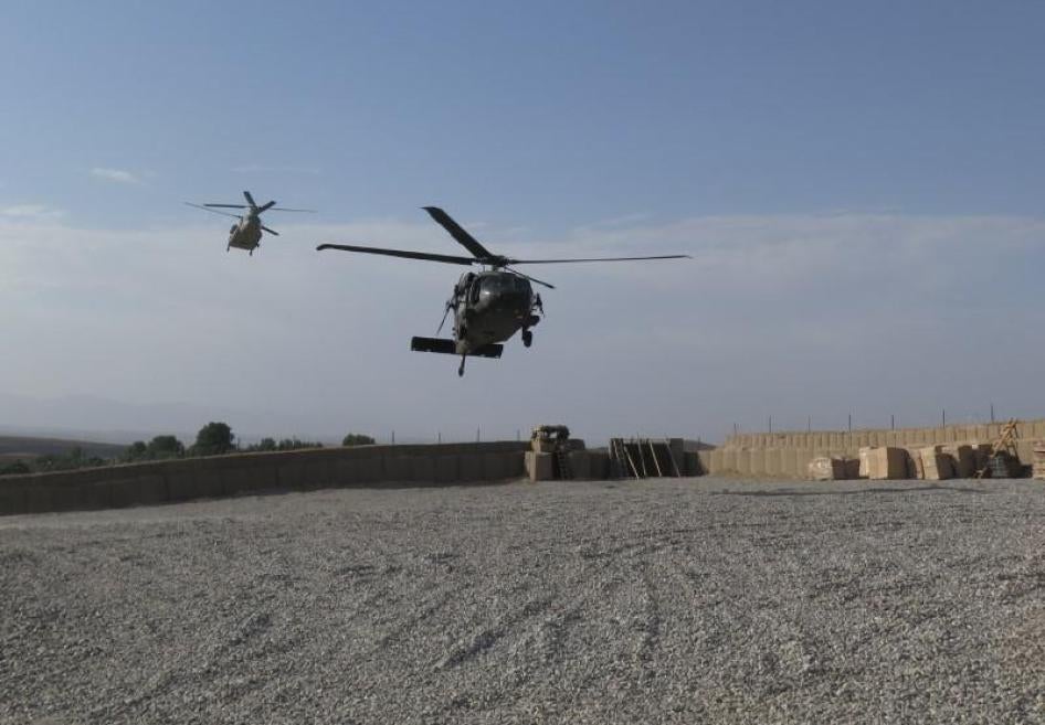 NATO helicopters land at an Afghan and US Special Forces base in Nangarhar province, Afghanistan, July 7, 2018.