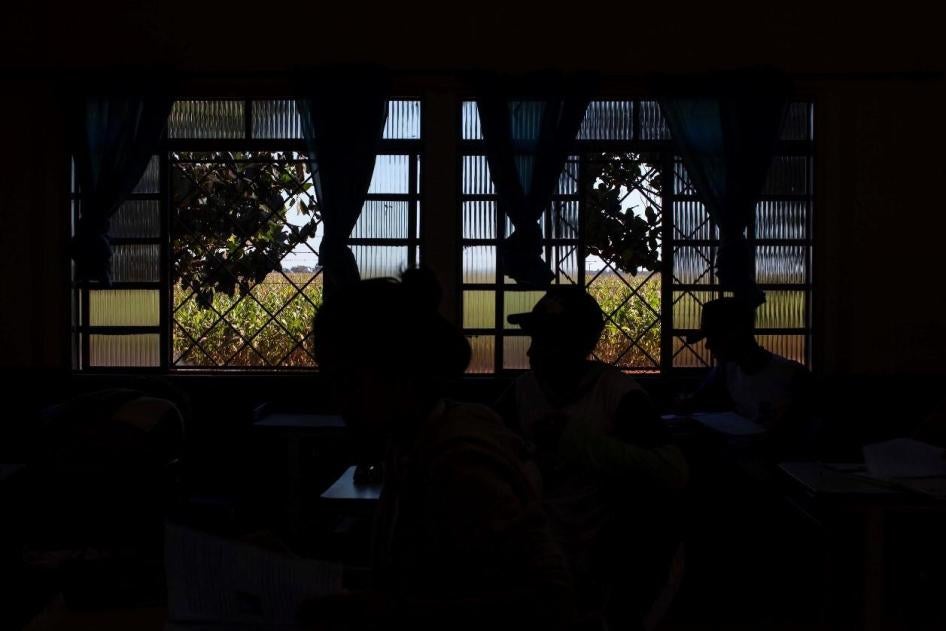 A classroom at a school located in the municipality of Primavera do Leste, Mato Grosso, looking out on the plantations immediately beside the school grounds. The school has just over 100 students, with classes for 15- and 16-year-old children during the d