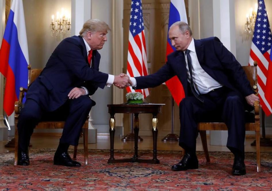 U.S. President Donald Trump and Russia's President Vladimir Putin shake hands as they meet in Helsinki, Finland July 16, 2018. 