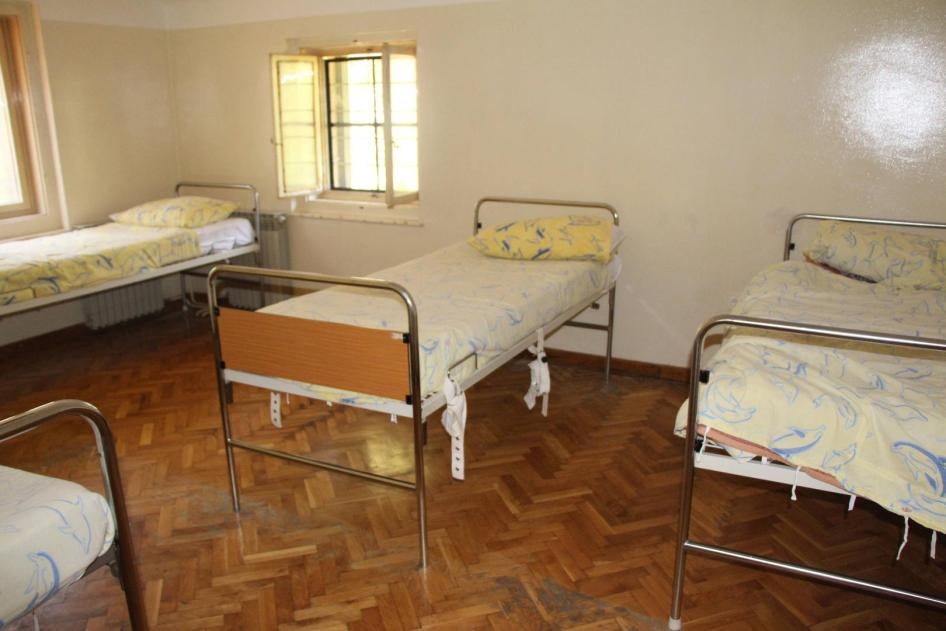 Restraints on a bed in a seclusion room for children in a psychiatric hospital