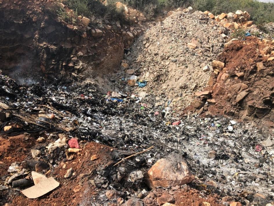 Smoke rising from the smoldering dump at Qabrikha, October 11, 2018, Qabrikha, Lebanon.