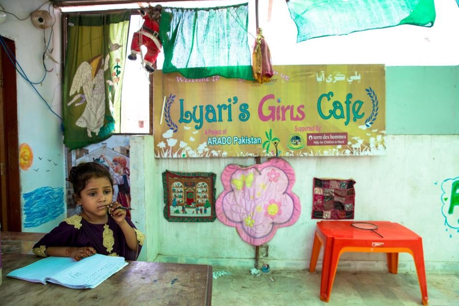 a girl studying at the lyari school.