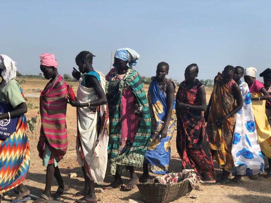 Women line up for food rations at a distribution site in Bentiu, South Sudan, on December 8, 2018.