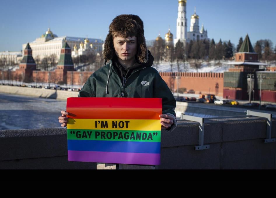 Russian blogger, Zhenya Svetski, stands with a sign reading “I am not ‘gay propaganda’” in Moscow, December 2018. 