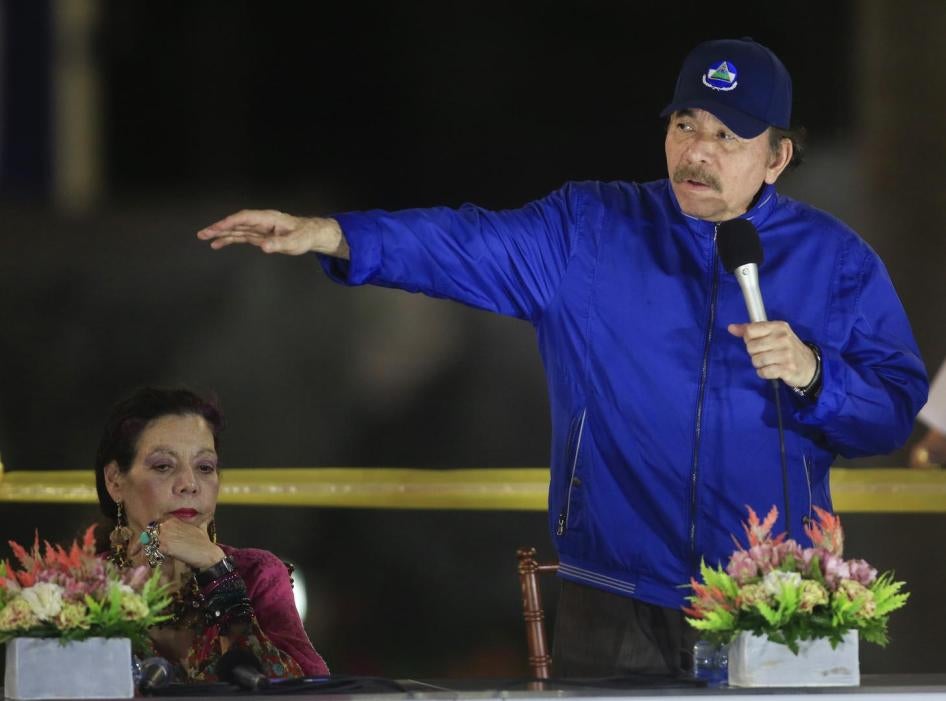 Nicaragua's President Daniel Ortega speaks next to first lady and Vice President Rosario Murillo during the inauguration ceremony of a highway overpass in Managua, Nicaragua, Thursday, March 21, 2019