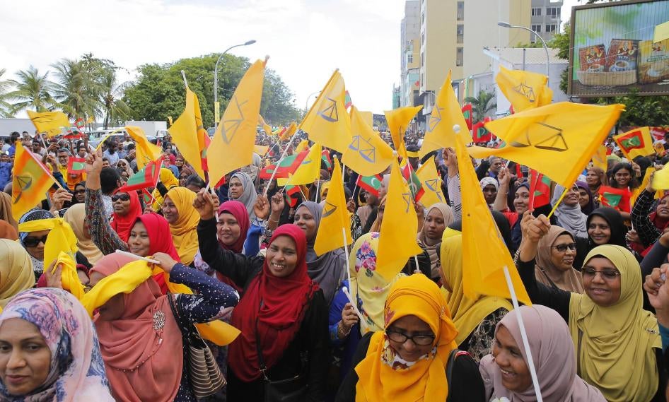 Supporters of challenger Ibrahim Mohamed Solih celebrate his victory in the presidential election, Malé, Maldives, September 24, 2018.