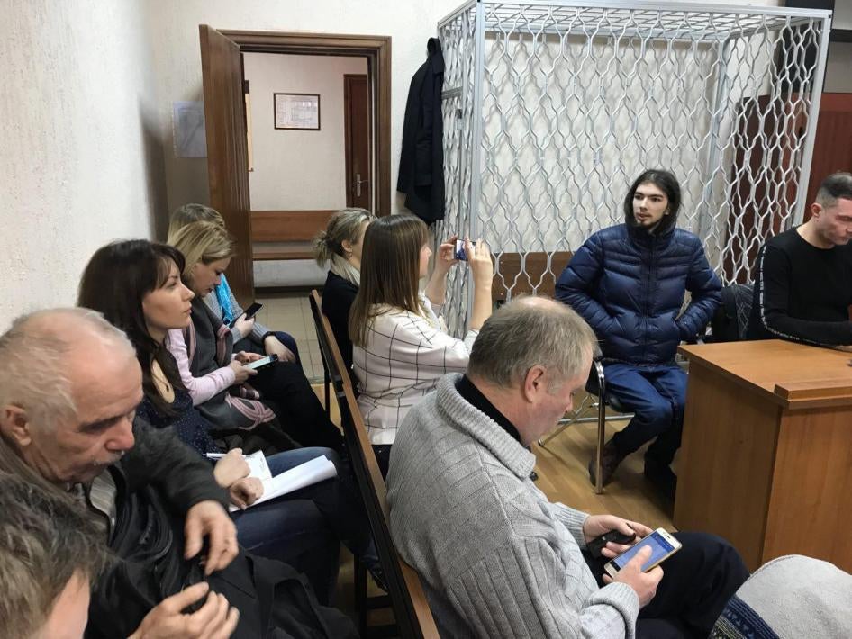 Ivan Luzin at the table with his lawyer Aleksandr Dobralsky in the Tsentralny District Court in Kaliningrad, February 25, 2019.