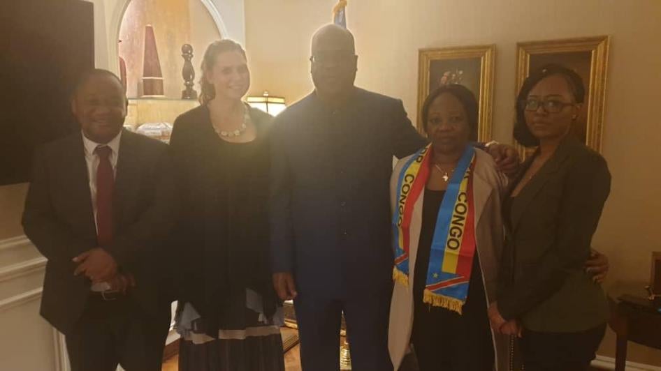 Pictured from left to right: Paul Nsapu (International Federation for Human Rights), Ida Sawyer (Human Rights Watch), President Felix Tshisekedi, and rights activist Floribert Chebeya’s widow and daughter, Annie and Merdie, in Washington, DC, April 6, 201