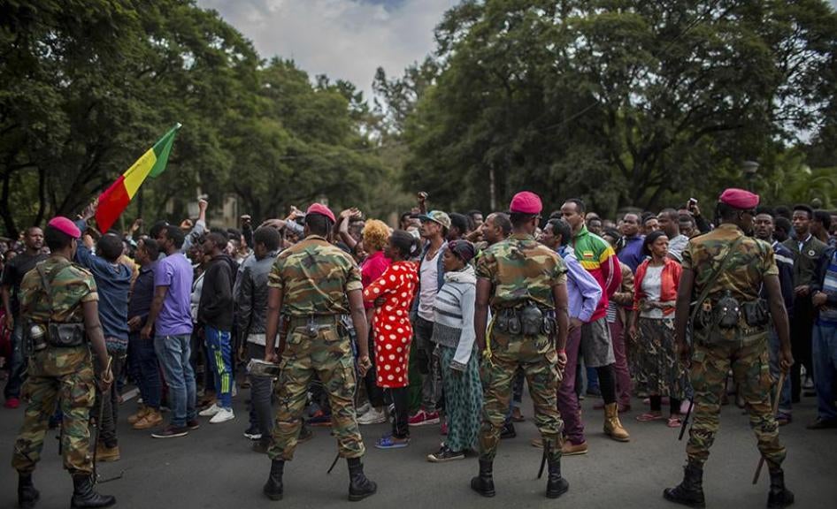 Ethiopian army soldiers attempt to control protestors from the capital and those displaced by ethnic-based violence over the weekend in Burayu, as they demonstrate to demand justice from the government in Addis Ababa, Ethiopia Monday, Sept. 17, 2018.