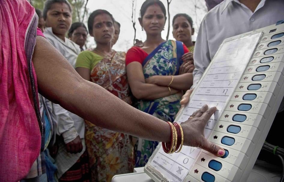 A woman casts her vote on a demo electronic voting machine during an election awareness drive ahead of India’s general election in Jorhat, India, April 1, 2019.