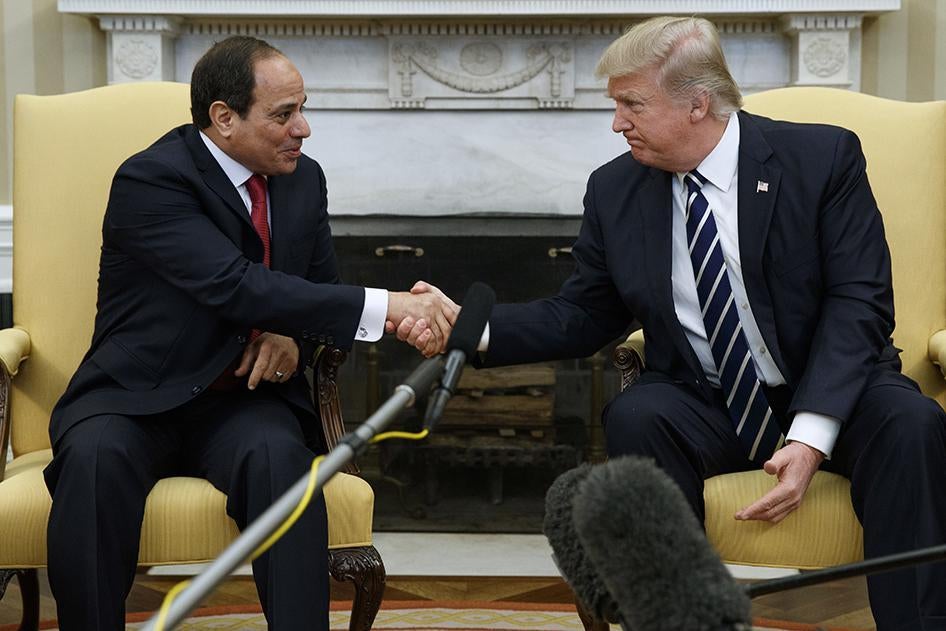 President Donald Trump shakes hands with Egyptian President Abdel Fattah al-Sisi in the Oval Office of the White House in Washington. © 2017 AP Images 