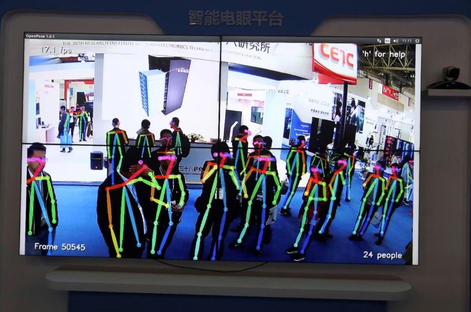 A display shows surveillance technology capable of analyzing body motion for specific actions like fighting, theft or fall during Security China 2018 in Beijing, China, Tuesday, Oct. 23, 2018. 