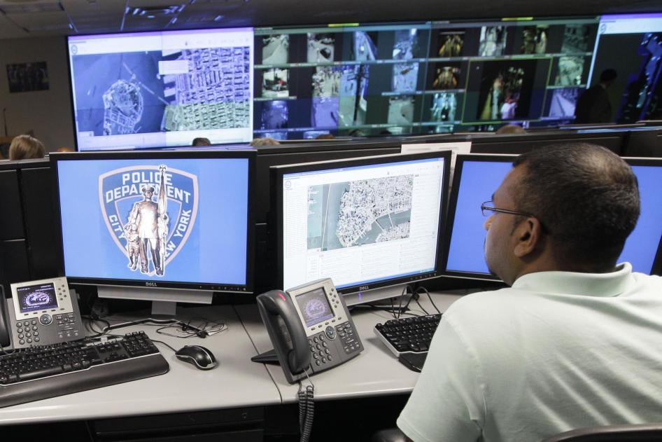 Police officer monitoring live video taken from cameras placed around New York City at the Lower Manhattan Security Coordination Center, in New York, July 28, 2011.
