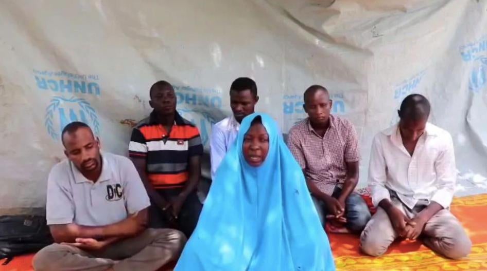 A screen grab taken from a video released on July 25, 2019 allegedly showing a female aid worker from Action Against Hunger and five male colleagues kidnapped in an attack in northeast Nigeria last week.